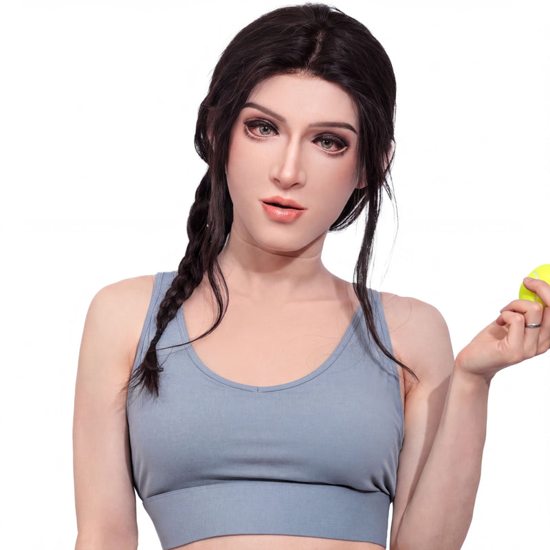 A woman with dark hair wearing a gray sports bra and holding a yellow ball.