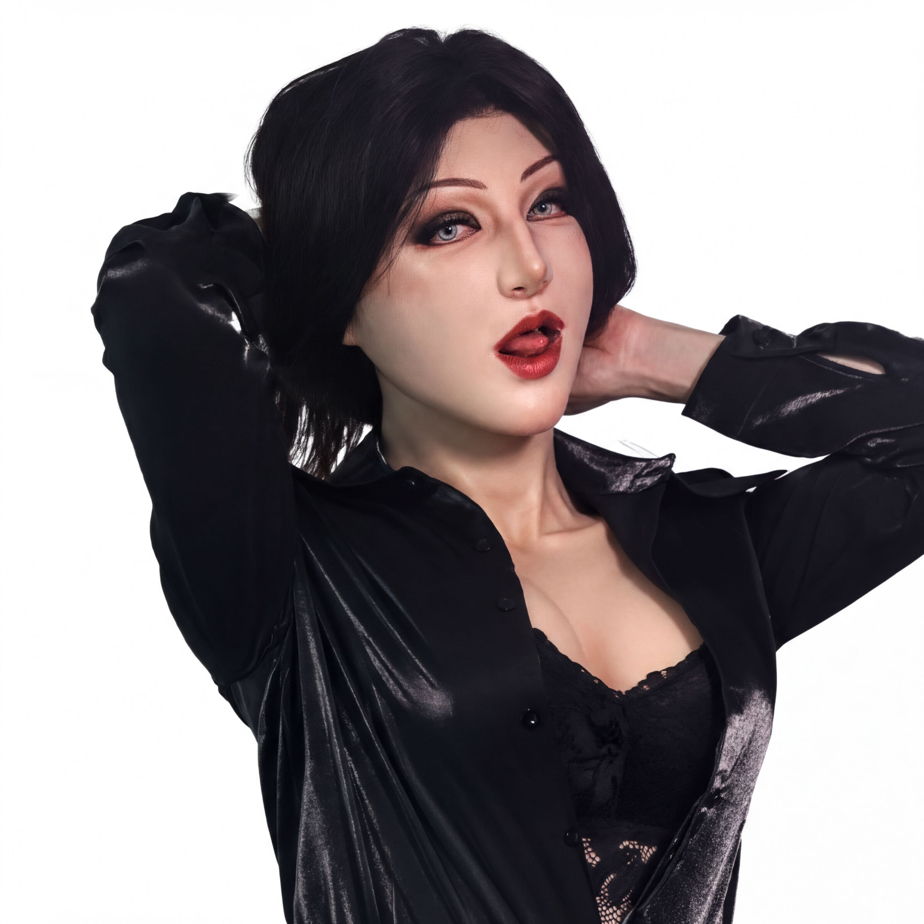 A woman with dark hair and red lipstick is posing in a black outfit against a white background.