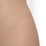 A close-up view of a light brown fabric or material, possibly a type of clothing or textile.