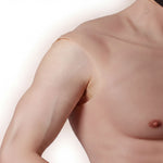a close-up view of a person's upper body, focusing on the shoulder and chest area.